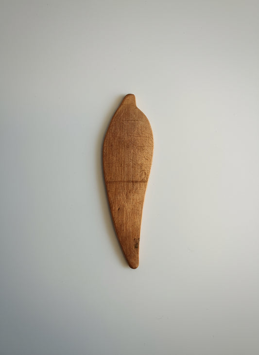 Small copper blank on a black cutting mat with measurements