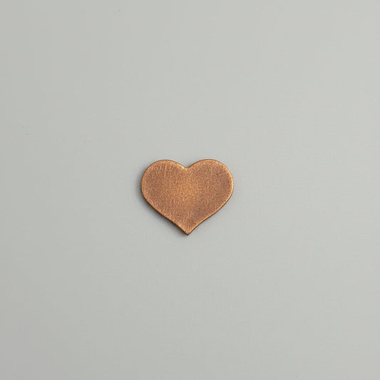 Heart-shaped object on a gray background